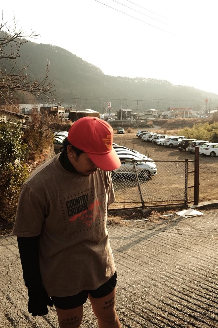 Runner wearing a red cap